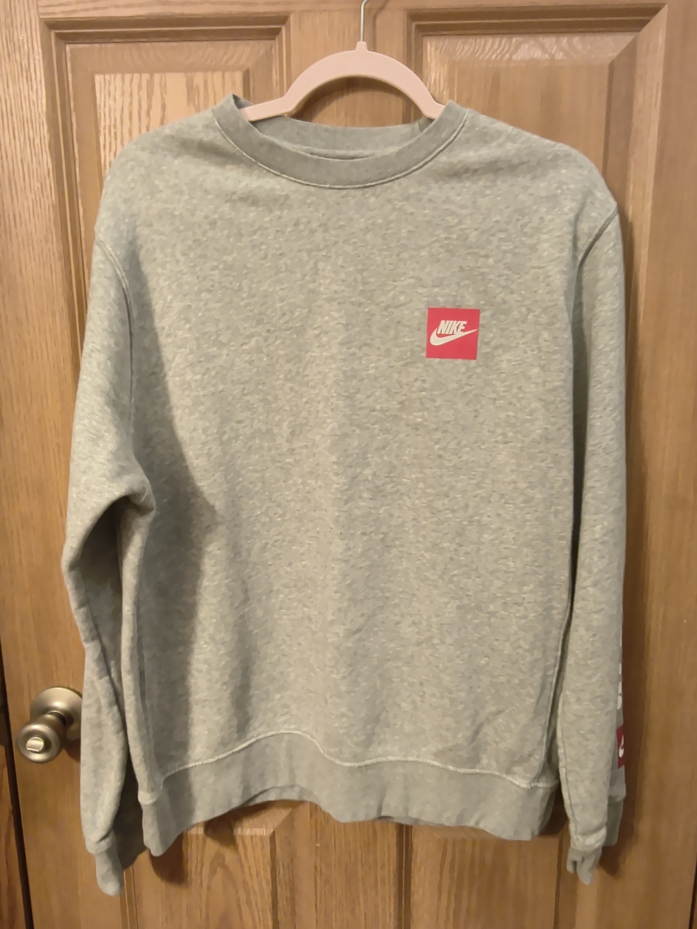 Nike Heather Gray Crewneck Sweatshirt with Red Logo Patch
